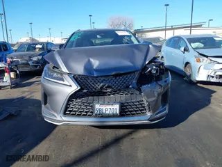 2022 Lexus RX with VIN 2T2HZMAA7NC245264, listed as a IAAI auction lot 41301838 with 36,266 mi miles. Bid and sale history available at carsss.com. Image 12.