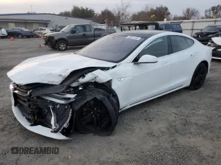 2016 Tesla Model S 70 kWh Battery with VIN 5YJSA1E19GF151945, listed as a Copart auction lot 83851454 with 74,473 mi miles and Non Repairable. Bid and sale history available at carsss.com. Image 1.