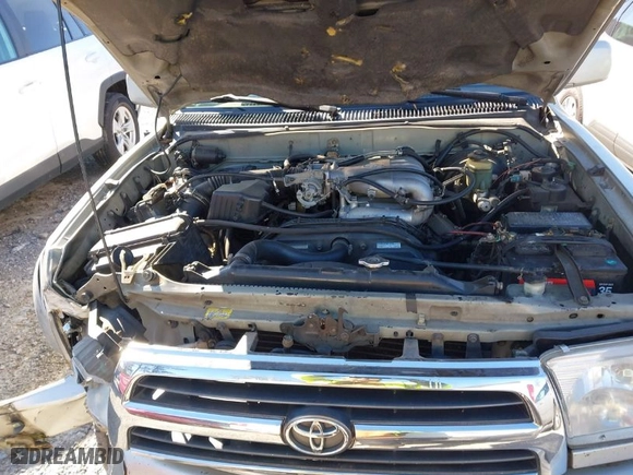 1999 Toyota 4Runner Limited with VIN JT3GN87R8X0101921, listed as a IAAI auction lot 41562115 with 403,948 mi miles. Bid and sale history available at carsss.com. Image 10.