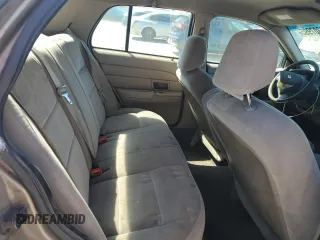 2003 Ford Police Interceptor Street Appear z VIN 2FAFP71W03X104811, wystawiony jako Copart lot #49307995 z przebiegiem 242 937 mil mil oraz Szkoda całkowita • Salvage title. Historia ofert i sprzedaży dostępna na DreamBid. Obrazek 10.