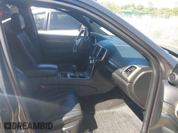 2014 Jeep Grand Cherokee Overland with VIN 1C4RJECG8EC409976, listed as a IAAI auction lot 41821685 with 186,105 mi miles. Bid and sale history available at carsss.com. Image 5.