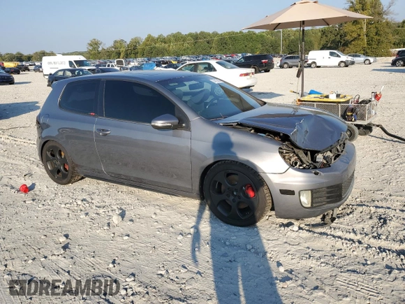 2010 Volkswagen GTI w/Sunroof with VIN WVWEV7AJ2AW239345, listed as a Copart auction lot 74179404 with 180,064 mi miles and Salvage Title. Bid and sale history available at carsss.com. Image 4.