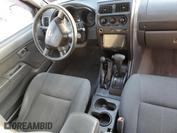 2003 Nissan Frontier XE z VIN 1N6ED26Y53C465862, wystawiony jako Copart lot #41848565 z przebiegiem Nie podano mil oraz Szkoda całkowita • Salvage title. Historia ofert i sprzedaży dostępna na DreamBid. Obrazek 8.