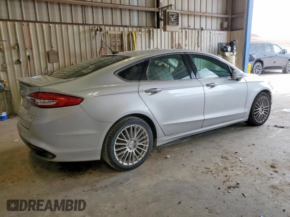 2018 Ford Fusion Titanium with VIN 3FA6P0D9XJR192422, listed as a Copart auction lot 58227575 with 138,420 mi miles and Salvage title. Bid and sale history available at DreamBid. Image 3.
