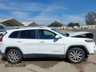 2016 Jeep Cherokee High Altitude with VIN 1C4PJLDB1GW264358, listed as a IAAI auction lot 41884632 with 87,250 mi miles. Bid and sale history available at carsss.com. Image 13.