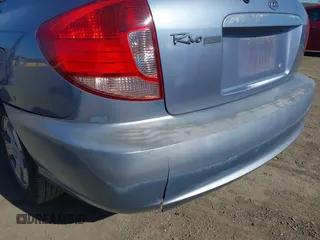 2004 Kia Rio with VIN KNADC165546190976, listed as a IAAI auction lot 41412051 with 186,378 mi miles. Bid and sale history available at carsss.com. Image 6.
