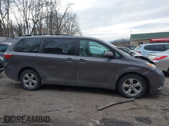 2015 Toyota Sienna LE AAS with VIN 5TDKK3DC6FS528608, listed as a IAAI auction lot 41492955 with 137,853 mi miles and . Bid and sale history available at DreamBid. Image 14.