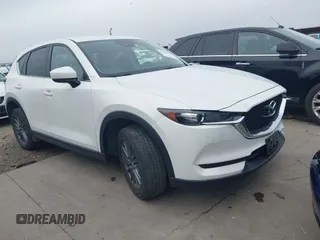 2017 Mazda CX-5 Touring z VIN JM3KFBCL5H0128584, wystawiony jako IAAI lot #42354669 z przebiegiem 56 563 mil mil oraz . Historia ofert i sprzedaży dostępna na DreamBid. Obrazek 1.