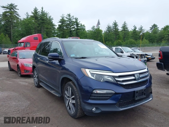 2017 Honda Pilot Touring with VIN 5FNYF6H99HB093136, listed as a IAAI auction lot 42507326 with 125,579 mi miles and . Bid and sale history available at DreamBid. Image 1.