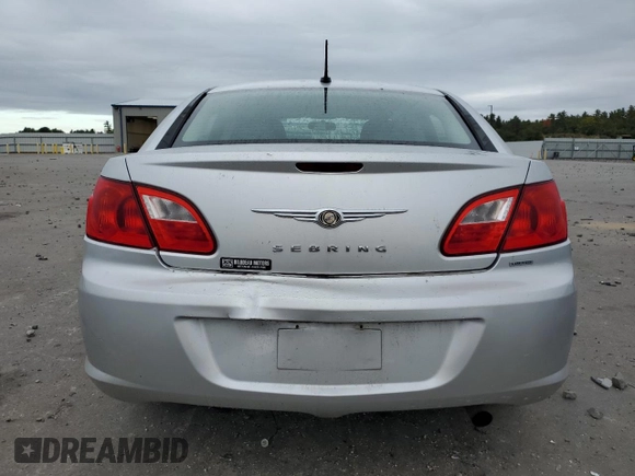 2010 Chrysler Sebring Limited with VIN 1C3CC5FD2AN194728, listed as a Copart auction lot 74457124 with 90,556 mi miles and Salvage title. Bid and sale history available at DreamBid. Image 6.