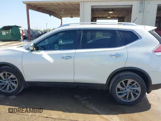 2016 Nissan Rogue SV with VIN KNMAT2MT1GP686630, listed as a IAAI auction lot 42000985 with 131,058 mi miles. Bid and sale history available at carsss.com. Image 14.