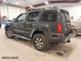 2013 Nissan Xterra Pro-4X with VIN 5N1AN0NW8DN816364, listed as a IAAI auction lot 41680564 with 197,768 mi miles. Bid and sale history available at carsss.com. Image 3.