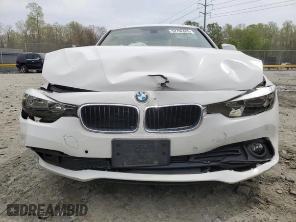 2017 BMW 3 Series 320i xDrive with VIN WBA8E5G5XHNU22436, listed as a Copart auction lot 52702805 with 74,008 mi miles and Salvage title. Bid and sale history available at DreamBid. Image 5.