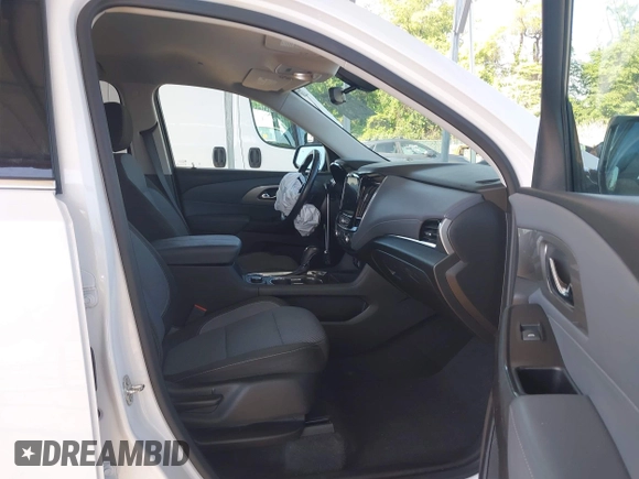 2018 Chevrolet Traverse LT Cloth z VIN 1GNEVGKWXJJ270664, wystawiony jako IAAI lot #42176492 z przebiegiem 73 534 mil mil oraz . Historia ofert i sprzedaży dostępna na DreamBid. Obrazek 5.