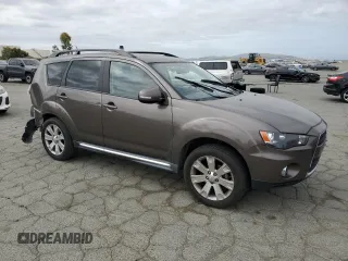 2011 Mitsubishi Outlander SE with VIN JA4AS3AW7BU027947, listed as a Copart auction lot 54623345 with 164,641 mi miles and Salvage title. Bid and sale history available at DreamBid. Image 4.