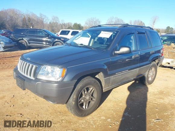 2004 Jeep Grand Cherokee Laredo z VIN 1J4GW48S24C159370, wystawiony jako IAAI lot #41296094 z przebiegiem 138 296 mil mil oraz . Historia ofert i sprzedaży dostępna na DreamBid. Obrazek 2.