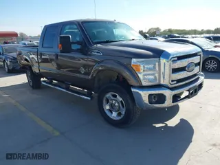 2015 Ford Super Duty F-250 SRW Lariat with VIN 1FT7W2BT2FED65128, listed as a IAAI auction lot 41037435 with 115,687 mi miles. Bid and sale history available at carsss.com. Image 1.