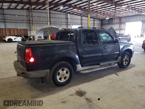 2001 Ford Explorer Sport Trac z VIN 1FMZU67E11UC81408, wystawiony jako Copart lot #64420975 z przebiegiem 185 127 mil mil oraz Szkoda całkowita • Salvage title. Historia ofert i sprzedaży dostępna na DreamBid. Obrazek 3.