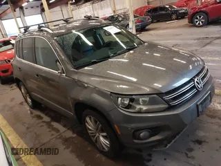 2012 Volkswagen Tiguan SE with VIN WVGBV7AX6CW006106, listed as a IAAI auction lot 41230737 with 151,774 mi miles and . Bid and sale history available at DreamBid. Image 1.