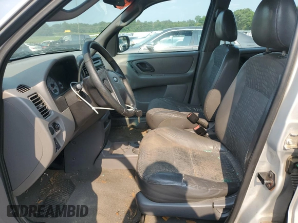 2002 Ford Escape XLS Choice z VIN 1FMYU01102KB13125, wystawiony jako Copart lot #59034495 z przebiegiem 202 253 mil mil oraz Szkoda całkowita • Salvage title. Historia ofert i sprzedaży dostępna na DreamBid. Obrazek 7.
