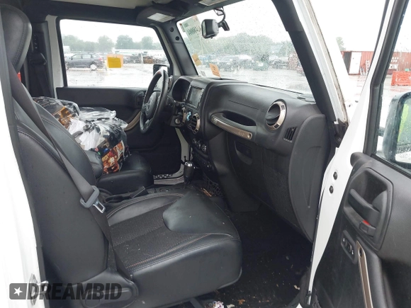 2017 Jeep Wrangler Unlimited 75th Anniversary with VIN 1C4BJWEG0HL559220, listed as a IAAI auction lot 42480004 with 54,168 mi miles and . Bid and sale history available at DreamBid. Image 5.