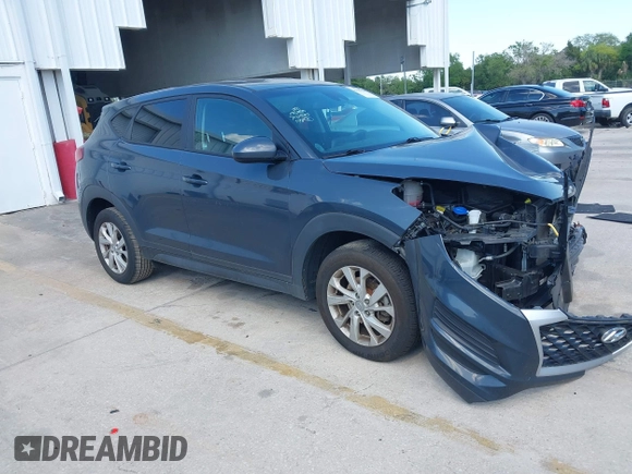 2021 Hyundai Tucson SE with VIN KM8J23A48MU379826, listed as a IAAI auction lot 41887834 with 51,885 mi miles and . Bid and sale history available at DreamBid. Image 1.
