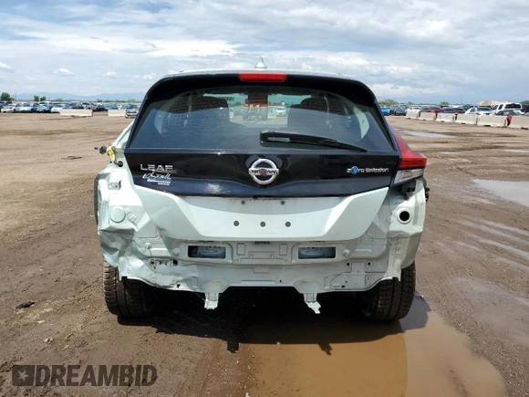 2018 Nissan LEAF SV z VIN 1N4AZ1CP9JC311747, wystawiony jako Copart lot #58365155 z przebiegiem 87 470 mil mil oraz Szkoda całkowita • Salvage title. Historia ofert i sprzedaży dostępna na DreamBid. Obrazek 6.