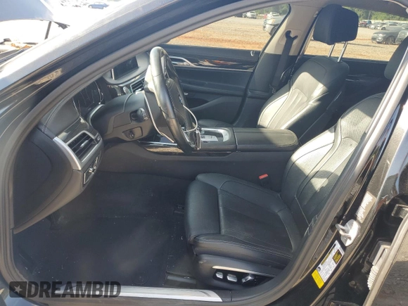 2017 BMW 7 Series 740i with VIN WBA7E2C57HG739482, listed as a Copart auction lot 53652145 with 102,418 mi miles and Salvage title. Bid and sale history available at DreamBid. Image 7.