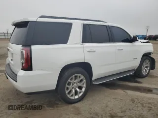 2015 GMC Yukon SLE with VIN 1GKS1AKC8FR733084, listed as a Copart auction lot 82960064 with 163,576 mi miles and Salvage Title. Bid and sale history available at carsss.com. Image 3.