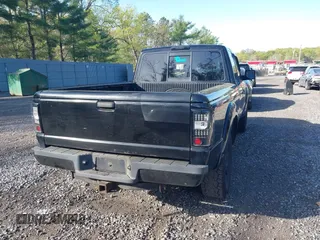2011 Ford Ranger XLT with VIN 1FTLR4FE9BPB07796, listed as a IAAI auction lot 42128597 with 235,512 mi miles. Bid and sale history available at carsss.com. Image 4.