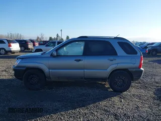 2006 Kia Sportage LX with VIN KNDJE723X67242610, listed as a IAAI auction lot 41735144 with 244,979 mi miles and . Bid and sale history available at DreamBid. Image 14.