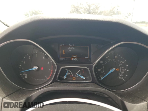 2016 Ford Focus SE z VIN 1FADP3F21GL386580, wystawiony jako Copart lot #63326425 z przebiegiem 82 139 mil mil oraz Szkoda całkowita • Salvage title. Historia ofert i sprzedaży dostępna na DreamBid. Obrazek 9.
