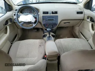 2007 Ford Focus S with VIN 1FAFP34N07W242359, listed as a Copart auction lot 61677025 with 164,445 mi miles and Salvage title. Bid and sale history available at DreamBid. Image 8.