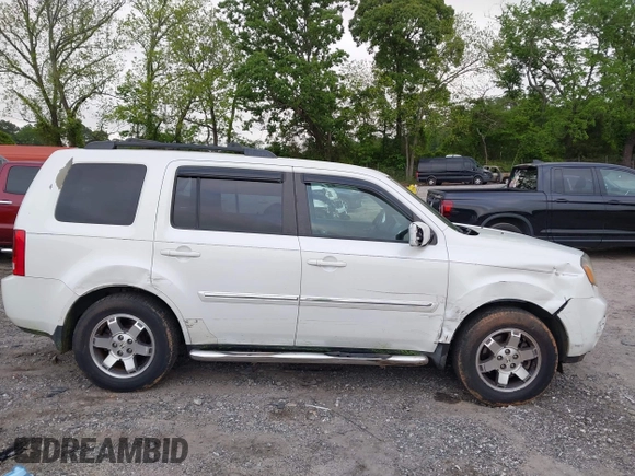 2011 Honda Pilot Touring z VIN 5FNYF4H9XBB053966, wystawiony jako IAAI lot #42148528 z przebiegiem 191 939 mil mil oraz . Historia ofert i sprzedaży dostępna na DreamBid. Obrazek 13.