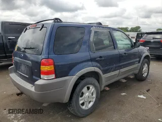 2002 Ford Escape XLT Choice with VIN 1FMYU04192KD87001, listed as a Copart auction lot 57860475 with 195,323 mi miles and Salvage title. Bid and sale history available at DreamBid. Image 3.