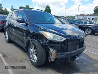 2013 Hyundai Santa Fe Sport z VIN 5XYZUDLA1DG050879, wystawiony jako IAAI lot #42236937 z przebiegiem 124 779 mil mil oraz . Historia ofert i sprzedaży dostępna na DreamBid. Obrazek 1.