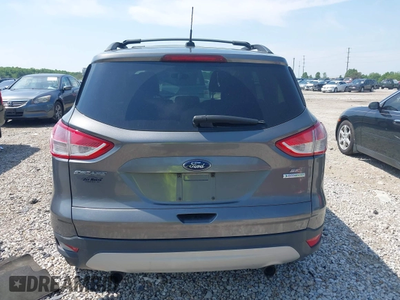 2013 Ford Escape SE with VIN 1FMCU0GX6DUB29519, listed as a IAAI auction lot 42281464 with 129,671 mi miles and . Bid and sale history available at DreamBid. Image 16.