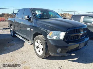 2014 Ram 1500 Tradesman with VIN 1C6RR6KT9ES112936, listed as a IAAI auction lot 41811778 with 147,654 mi miles. Bid and sale history available at carsss.com. Image 1.