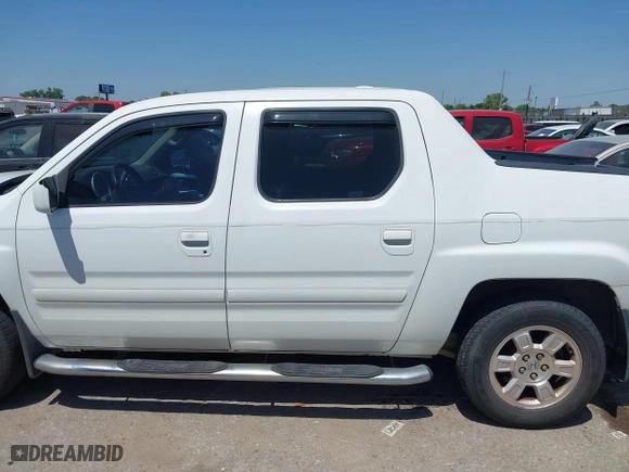 2008 Honda Ridgeline RTL with VIN 2HJYK16568H529221, listed as a IAAI auction lot 42027640 with 143,536 mi miles. Bid and sale history available at carsss.com. Image 14.