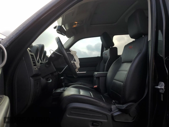 2008 Dodge Nitro R/T with VIN 1D8GU58618W245621, listed as a Copart auction lot 77798384 with 151,784 mi miles and Salvage Title. Bid and sale history available at DreamBid. Image 7.