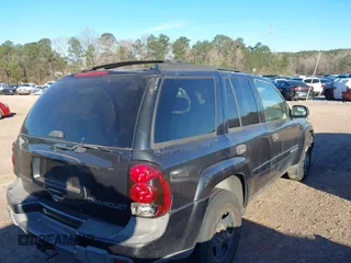 2003 Chevrolet TrailBlazer LS with VIN 1GNDS13SX32251607, listed as a IAAI auction lot 41613042 with 129,380 mi miles. Bid and sale history available at carsss.com. Image 4.