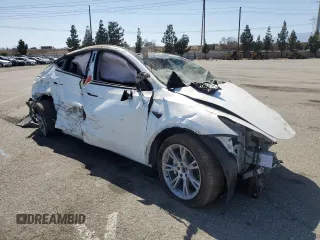 2023 Tesla Model Y Long Range z VIN 7SAYGDEE3PA077841, wystawiony jako Copart lot #54535215 z przebiegiem Nie podano mil oraz Szkoda całkowita • Salvage title. Historia ofert i sprzedaży dostępna na DreamBid. Obrazek 4.