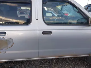 2003 Nissan Frontier SE z VIN 1N6ED29X33C433737, wystawiony jako IAAI lot #41271135 z przebiegiem 289 098 mil mil oraz . Historia ofert i sprzedaży dostępna na DreamBid. Obrazek 13.