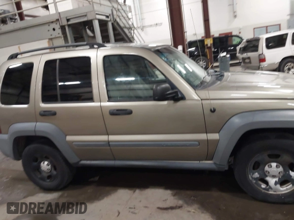 2005 Jeep Liberty Sport with VIN 1J4GL48K15W593739, listed as a IAAI auction lot 41169805 with 200,482 mi miles. Bid and sale history available at carsss.com. Image 13.