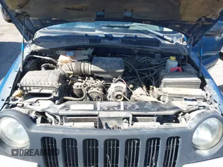 2003 Jeep Liberty Sport with VIN 1J4GL48K03W569834, listed as a IAAI auction lot 42061973 with 278,475 mi miles. Bid and sale history available at carsss.com. Image 10.
