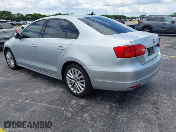 2011 Volkswagen Jetta SEL with VIN 3VWLX7AJ1BM352557, listed as a IAAI auction lot 42569321 with 130,321 mi miles and . Bid and sale history available at DreamBid. Image 3.