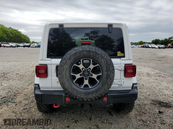 2018 Jeep Wrangler Unlimited Rubicon with VIN 1C4HJXFG2JW244664, listed as a Copart auction lot 52987455 with 40,463 mi miles and Salvage title. Bid and sale history available at DreamBid. Image 6.