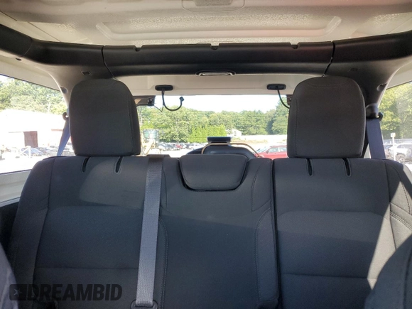 2022 Jeep Wrangler Unlimited High Tide with VIN 1C4HJXDG9NW132131, listed as a Copart auction lot 69314354 with 33,711 mi miles and Salvage Title. Bid and sale history available at DreamBid. Image 10.