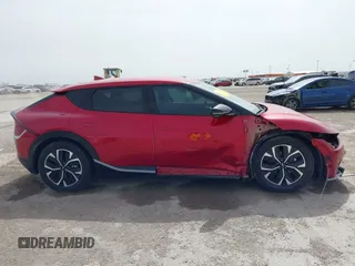 2022 Kia EV6 Wind z VIN KNDC3DLC6N5089018, wystawiony jako IAAI lot #41748175 z przebiegiem 25 157 mil mil oraz . Historia ofert i sprzedaży dostępna na DreamBid. Obrazek 13.