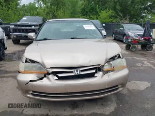 2002 Honda Accord EX z VIN 1HGCG16582A073438, wystawiony jako IAAI lot #42109802 z przebiegiem 172 379 mil mil oraz . Historia ofert i sprzedaży dostępna na DreamBid. Obrazek 6.